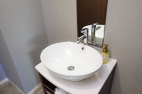 Mr. Kinjo inn D-buil