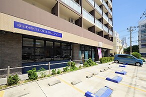 Mr. Kinjo inn D-buil