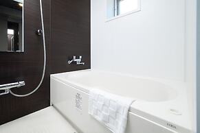 Mr. Kinjo inn D-buil