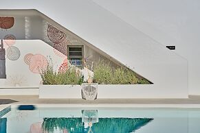 Adorno Beach Hotel & Suites