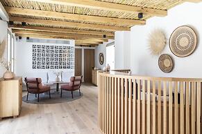 Adorno Beach Hotel & Suites