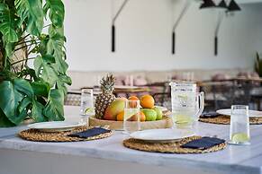 Adorno Beach Hotel & Suites