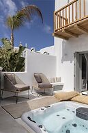 Adorno Beach Hotel & Suites