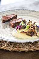 Adorno Beach Hotel & Suites