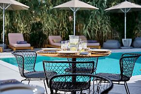 Adorno Beach Hotel & Suites