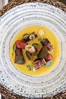 Adorno Beach Hotel & Suites