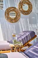 Adorno Beach Hotel & Suites