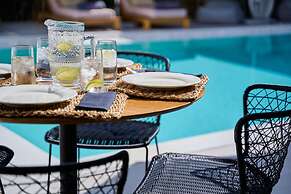 Adorno Beach Hotel & Suites