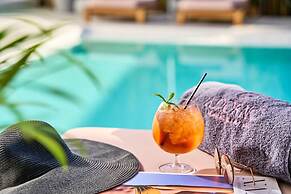 Adorno Beach Hotel & Suites