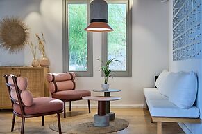 Adorno Beach Hotel & Suites