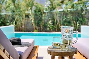 Adorno Beach Hotel & Suites