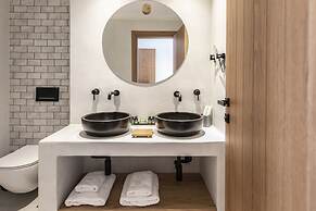 Adorno Beach Hotel & Suites