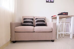 2 Bedrooms at Green Pramuka City Apartment By Travelio