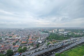 2 Bedrooms at Green Pramuka City Apartment By Travelio