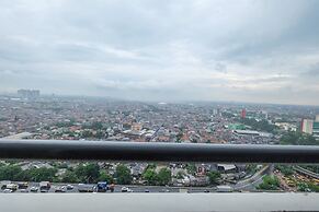 2 Bedrooms at Green Pramuka City Apartment By Travelio