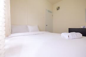2 Bedrooms at Green Pramuka City Apartment By Travelio