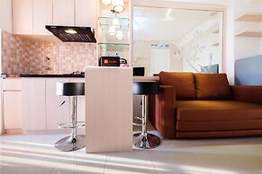 2 Bedrooms at Bassura City Apartment with Mall Access By Travelio