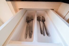 2 Bedrooms at Bassura City Apartment with Mall Access By Travelio