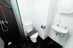 Minimalist Studio at Bassura City Apartment By Travelio