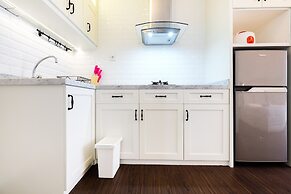 Minimalist Studio at Bassura City Apartment By Travelio