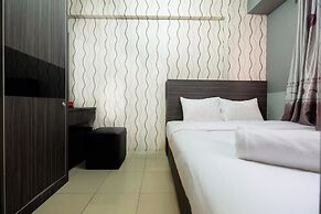 Monochrome Style 2 Bedrooms at Kalibata City Apartment By Travelio