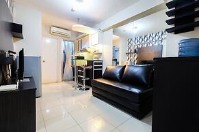 Monochrome Style 2 Bedrooms at Kalibata City Apartment By Travelio