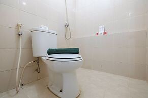 Monochrome Style 2 Bedrooms at Kalibata City Apartment By Travelio