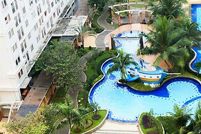 Monochrome Style 2 Bedrooms at Kalibata City Apartment By Travelio