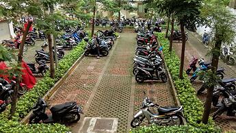 Monochrome Style 2 Bedrooms at Kalibata City Apartment By Travelio