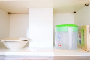 Monochrome Style 2 Bedrooms at Kalibata City Apartment By Travelio