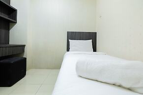 Monochrome Style 2 Bedrooms at Kalibata City Apartment By Travelio