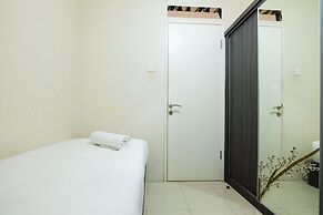 Monochrome Style 2 Bedrooms at Kalibata City Apartment By Travelio