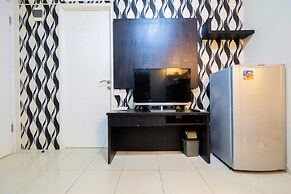 Monochrome Style 2 Bedrooms at Kalibata City Apartment By Travelio