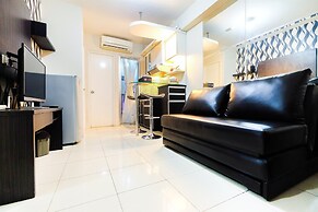 Monochrome Style 2 Bedrooms at Kalibata City Apartment By Travelio