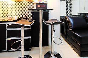 Monochrome Style 2 Bedrooms at Kalibata City Apartment By Travelio