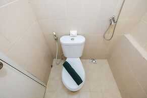 Monochrome Style 2 Bedrooms at Kalibata City Apartment By Travelio