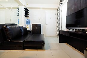 Monochrome Style 2 Bedrooms at Kalibata City Apartment By Travelio