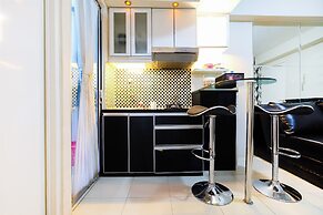 Monochrome Style 2 Bedrooms at Kalibata City Apartment By Travelio