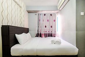 Monochrome Style 2 Bedrooms at Kalibata City Apartment By Travelio