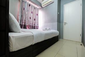 Monochrome Style 2 Bedrooms at Kalibata City Apartment By Travelio