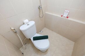 Monochrome Style 2 Bedrooms at Kalibata City Apartment By Travelio