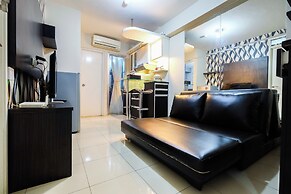 Monochrome Style 2 Bedrooms at Kalibata City Apartment By Travelio