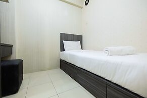 Monochrome Style 2 Bedrooms at Kalibata City Apartment By Travelio