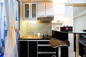Monochrome Style 2 Bedrooms at Kalibata City Apartment By Travelio