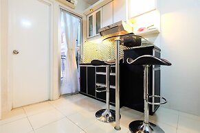 Monochrome Style 2 Bedrooms at Kalibata City Apartment By Travelio