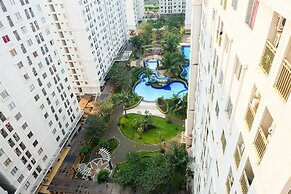 Monochrome Style 2 Bedrooms at Kalibata City Apartment By Travelio