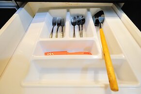 Monochrome Style 2 Bedrooms at Kalibata City Apartment By Travelio