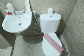 Simply Studio Room at Grand Serpong Apartment By Travelio