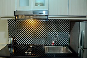 Simply Studio Room at Grand Serpong Apartment By Travelio