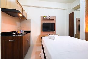 Studio Room at Green Pramuka City Apartment with Mall Access By Travel